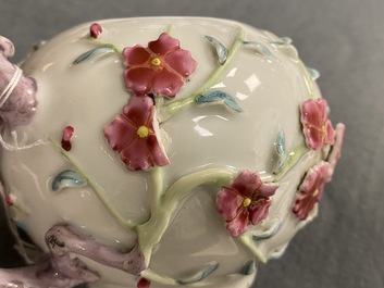 A pair of Chinese famille rose relief-decorated teapots with floral design, Yongzheng